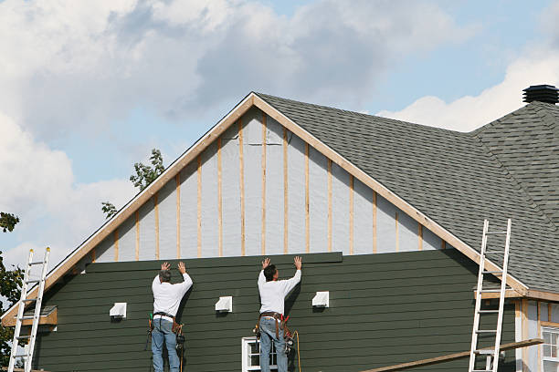 Professional Siding Installation technician working in The Plains, OH
